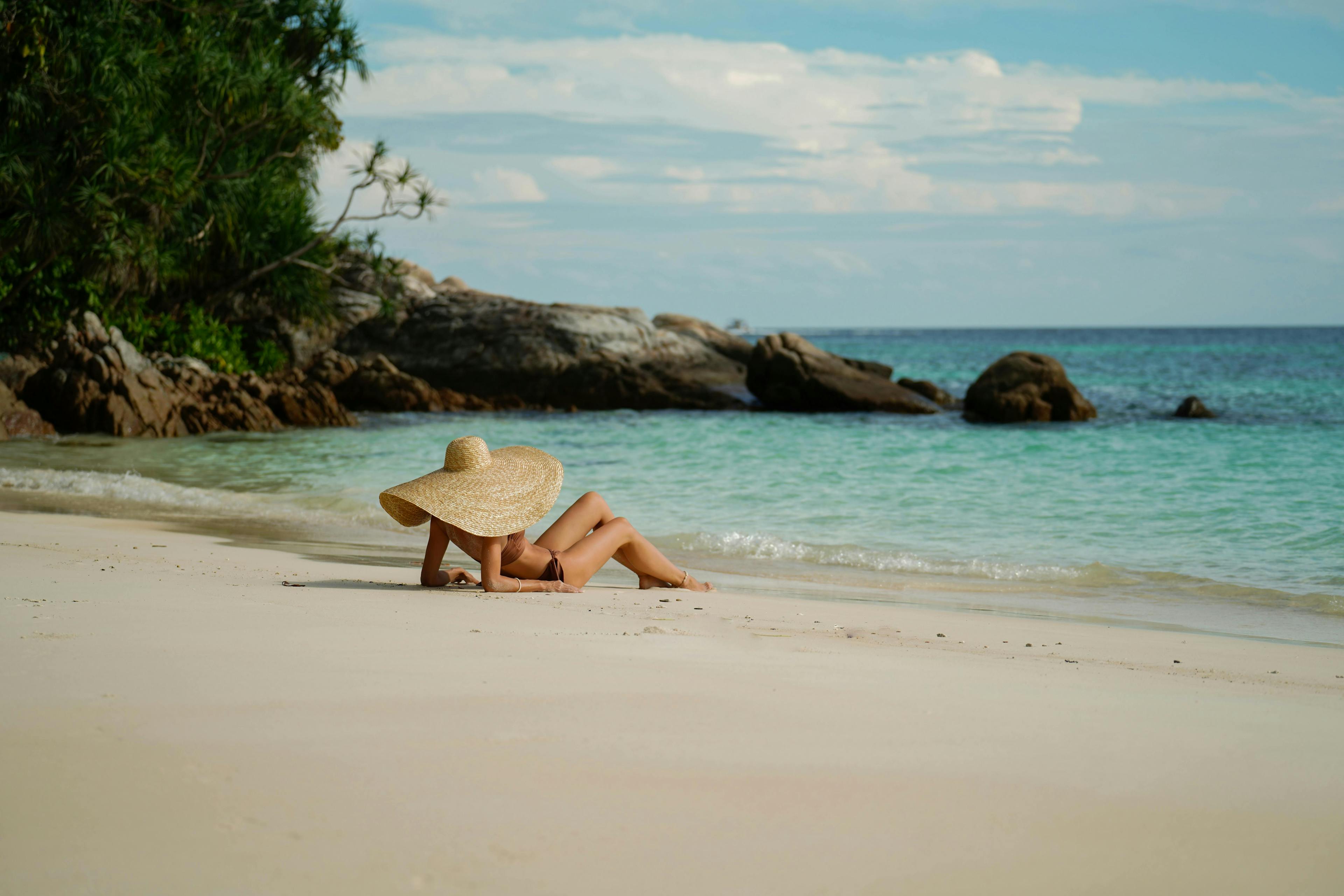 sunbathing,beauty,perfect,happy,slim,body,enjoying,swimwear,legs,thailand,hat,model,swimsuit,female,resort,lying,dreaming,tan,attractive,real,girl,water,coast,sand,ocean,paradise,woman,young,tourism,holiday,sea,summer,tanning,rock,alone,bikini,vacation,leisure,nature,relax,shore,photo,lifestyle,tropical,beach,authentic,lady,travel,fun hat summer sun hat adult female person woman outdoors sea beach