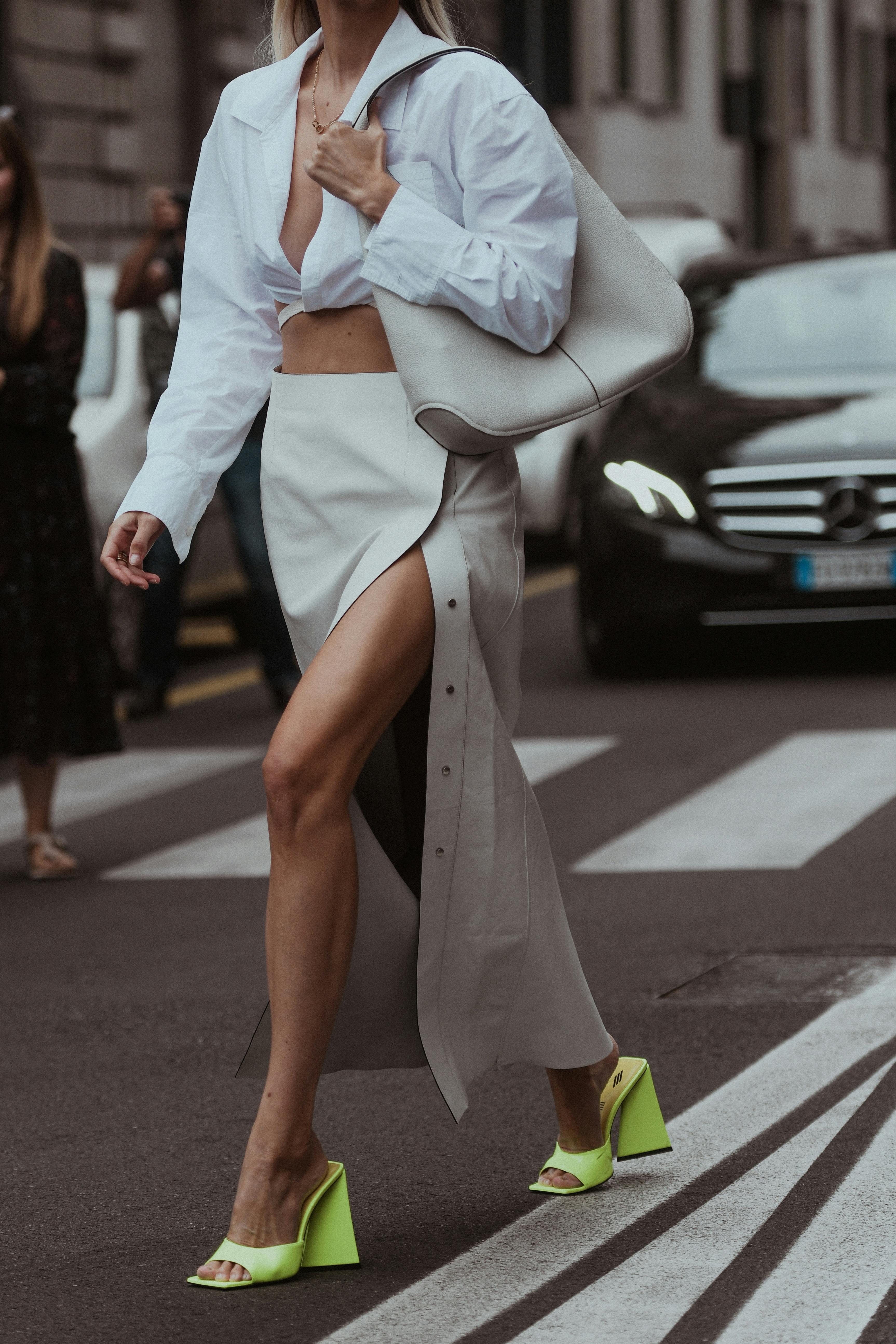 long skirt,shop,woman,gold juste un clou,open toe-cap,blogger,yellow,salvatore ferragamo,body,milan,fashionista,beautiful,outfit,paris,influencer,design,block,model,editorial,sunglasses,tied with straps,business,boutique,neon,street style,heels,grained,2022,pale gray,bracelet,collection,shoes,leather,handbag,gucci,luxury,clothing,shiny,style,waist,detail,cropped shirt,cartier,earrings,fashion,women high heel shoe tarmac adult female person woman car skirt handbag